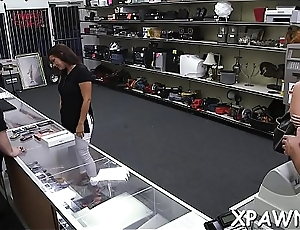 Amazing young woman is having sex in shop with dude