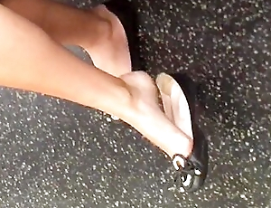 Amateur Businesswoman Dangles Her Candid Ballerina Shoes In Public