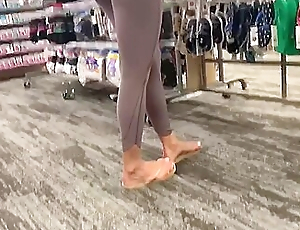 Spying Hottie In the air Sexy Leggings And Flip Flops At The Socks Store