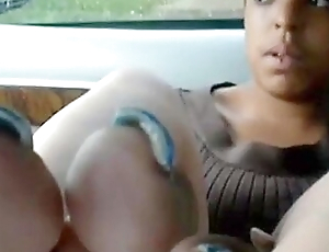 Hot Ebony Is In The Car Getting Horny And Playing With Her Black Feet