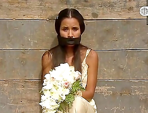 Girl In White Dress Otm Gagged With Flowers