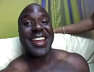 Black guy lets tramp marque black whore ride his obese cock on the sofa